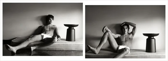 Black and white diptych of a shirtless man in white briefs lounging on a low cushioned bench next to a sculptural black side table.