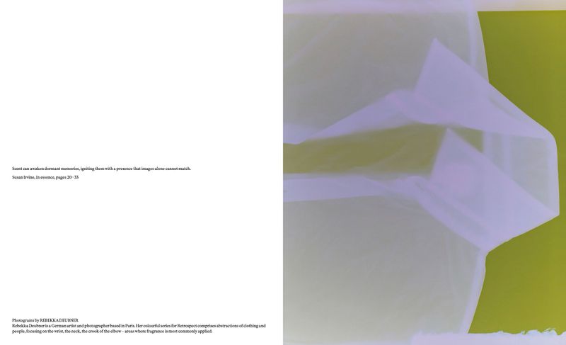Abstract fashion photography featuring draped white fabric against a light green background, creating a soft, textured visual.