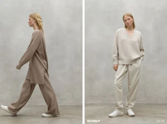 Model wearing neutral knitwear and trousers posing against a grey textured studio wall for Ecoalf Woman collection AW24