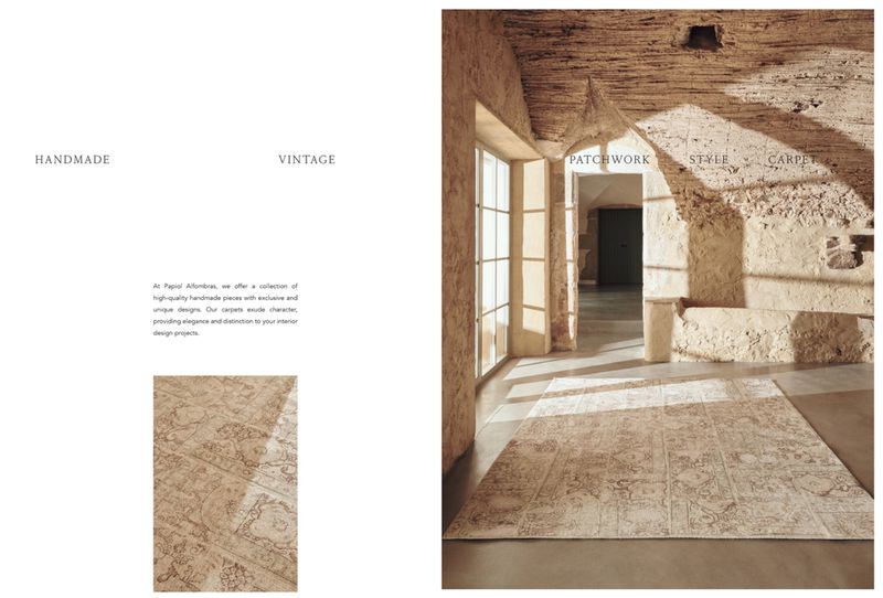 Interior design featuring a vintage patchwork carpet in a room with stone walls, an arched doorway, and natural light from a nearby window.