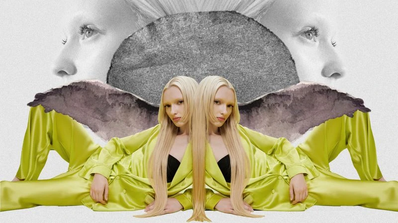 Surreal portrait featuring two mirrored women in chartreuse satin loungewear, set against a monochromatic collage background with torn edges.