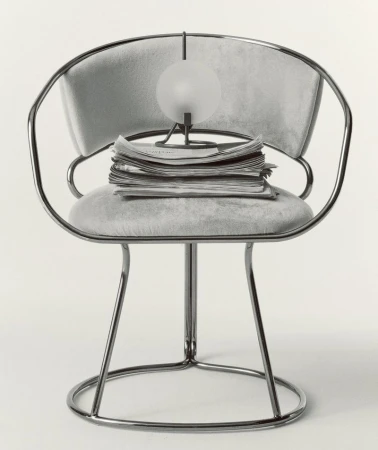 Chrome chair with grey cushions, a stack of newspapers, and a spherical lamp, set against a plain backdrop, creating a minimalist aesthetic.