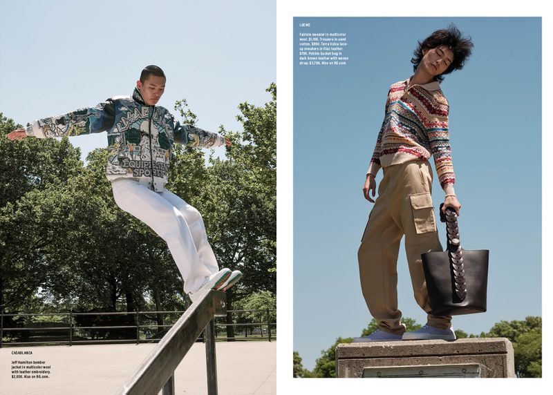 Editorial fashion shot of two young adult men in streetwear. One man is balancing on a skate rail; the other stands holding a handbag.