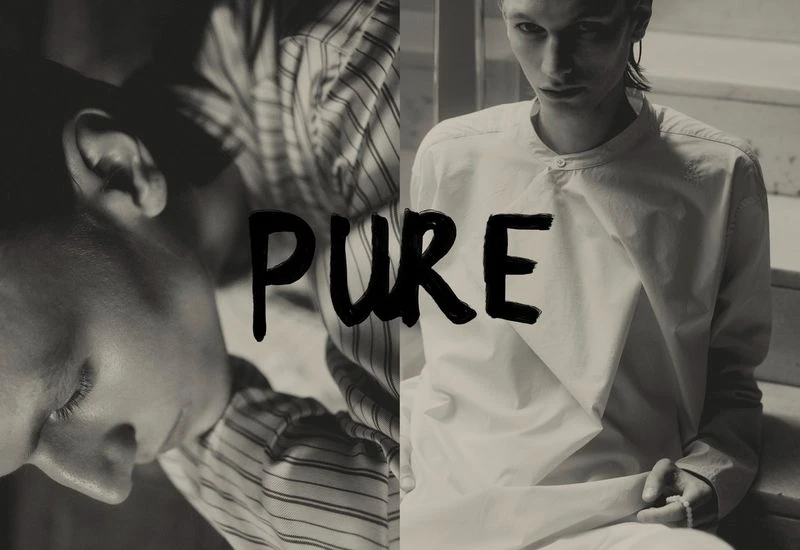 Monochrome fashion shot of two young adult models in a split frame featuring one model with eyes closed and the other in white clothing.