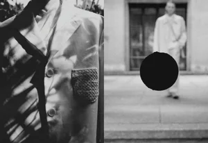 Diomene S/S 25 lookbook split image featuring a close-up blazer detail and an out-of-focus standing model with a dark circular cutout.