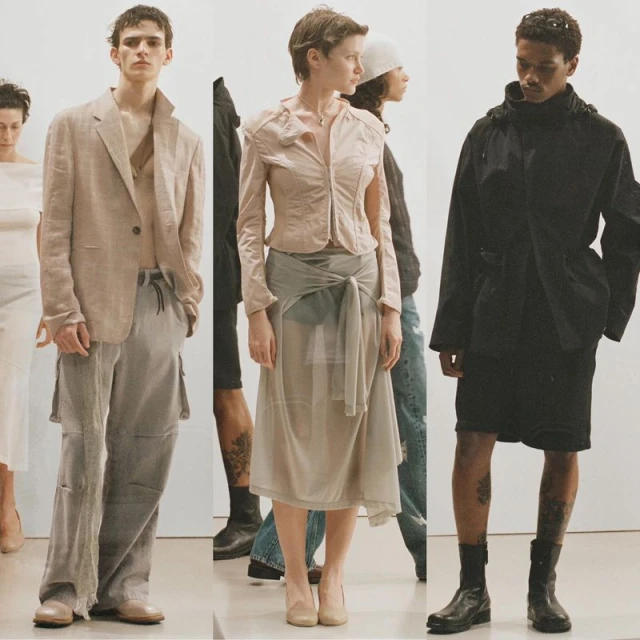 Fashion editorial shot: Several fashion models in neutral-toned garments pose against a white background in an eye-level, medium shot.