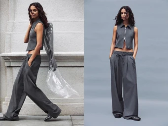 Model in grey zip crop top and matching wide leg trousers posing outdoors for Pull and Bear around the city project