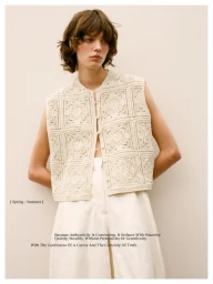 Model wearing a cream crochet vest and white trousers against a plain light background for Massimo Dutti