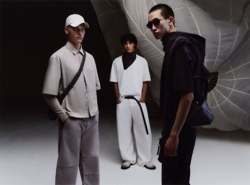 Three male models in contemporary apparel posing against a studio backdrop for Zara Basez, photographed by Gus&Lo.