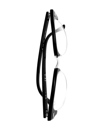 Black eyeglasses with clear lenses are isolated against a white background, showcasing the product for eyewear fashion and vision correction.