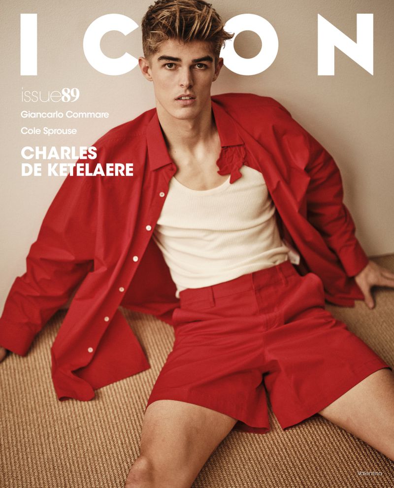 Magazine cover featuring a male fashion model in a red button-down shirt and red shorts, with 'ICON' text displayed.