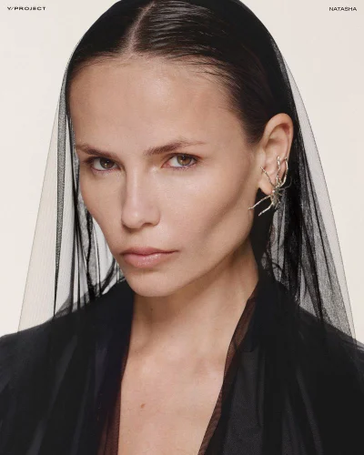 Natasha Poly wearing black sheer veil and spider ear cuff for Y/Project Fall Winter 24 lookbook portrait