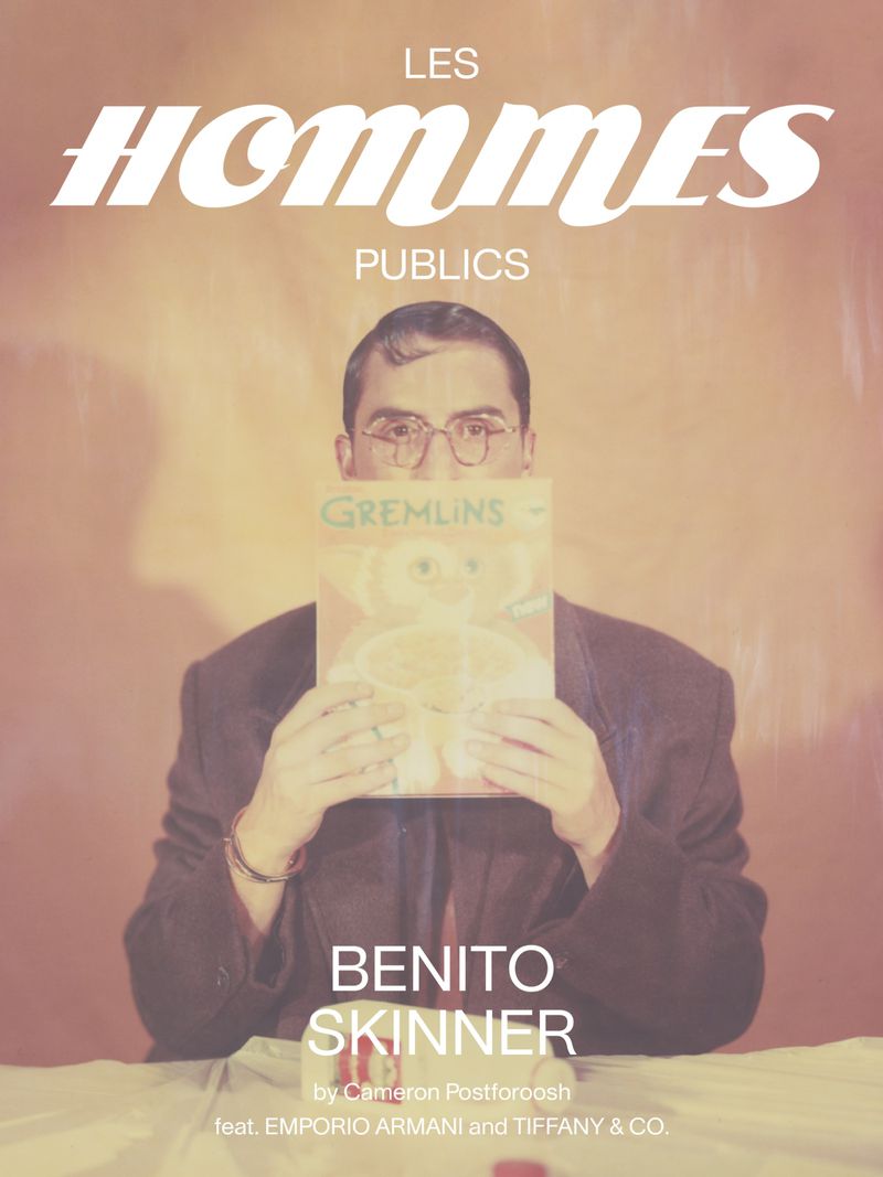 Benito Skinner holding a Gremlins magazine covering his face for Les Hommes Publics