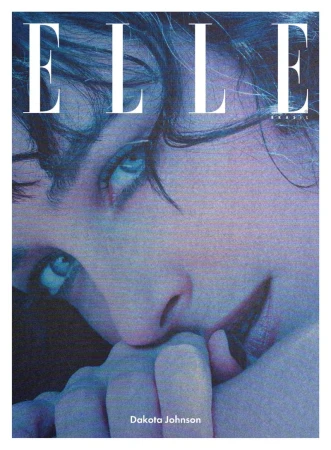 Close-up portrait of Dakota Johnson for Elle Brasil magazine cover with a blue-lavender color grade. She is holding her hand to her mouth.