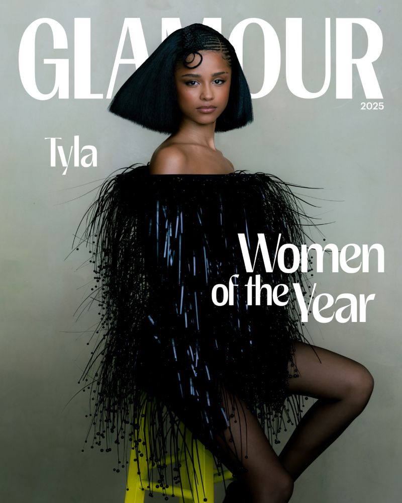 Glamour magazine cover featuring a young Black woman with short, sleek hair and a black beaded dress, seated on a bright yellow stool.