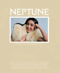 Golshifteh Farahani smiling in a cream shearling vest against a pale background for Neptune Papers Issue 9