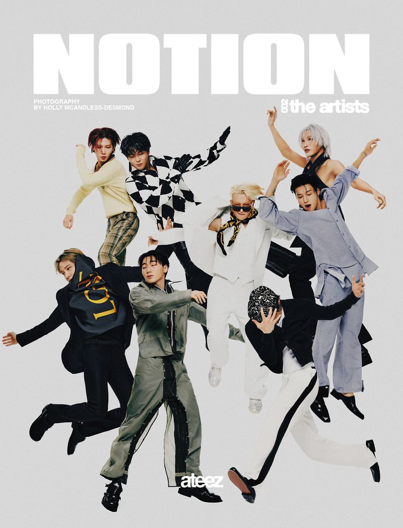 Magazine cover featuring a group of eight Asian adults striking dynamic poses against a light background, fashion, youth and artistry.