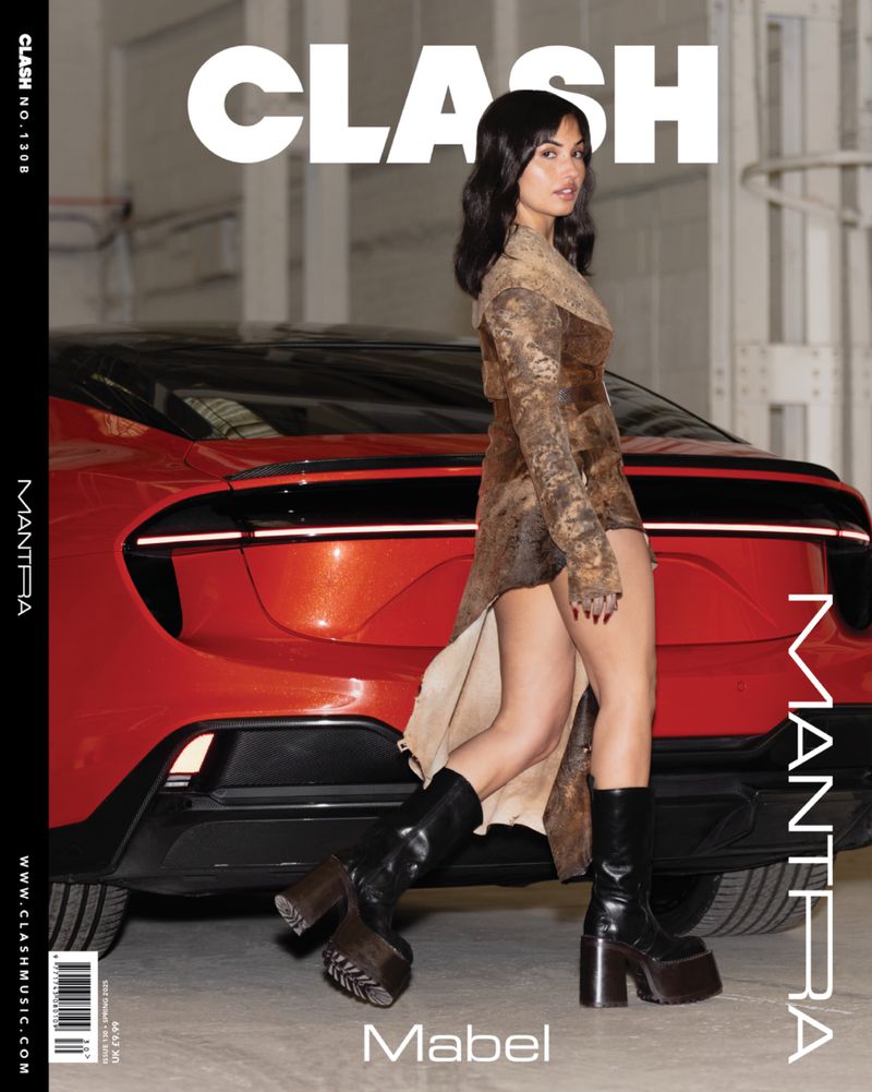 Mabel poses beside a red sports car on the cover of Clash magazine. The image features a combination of fashion and automotive elements.