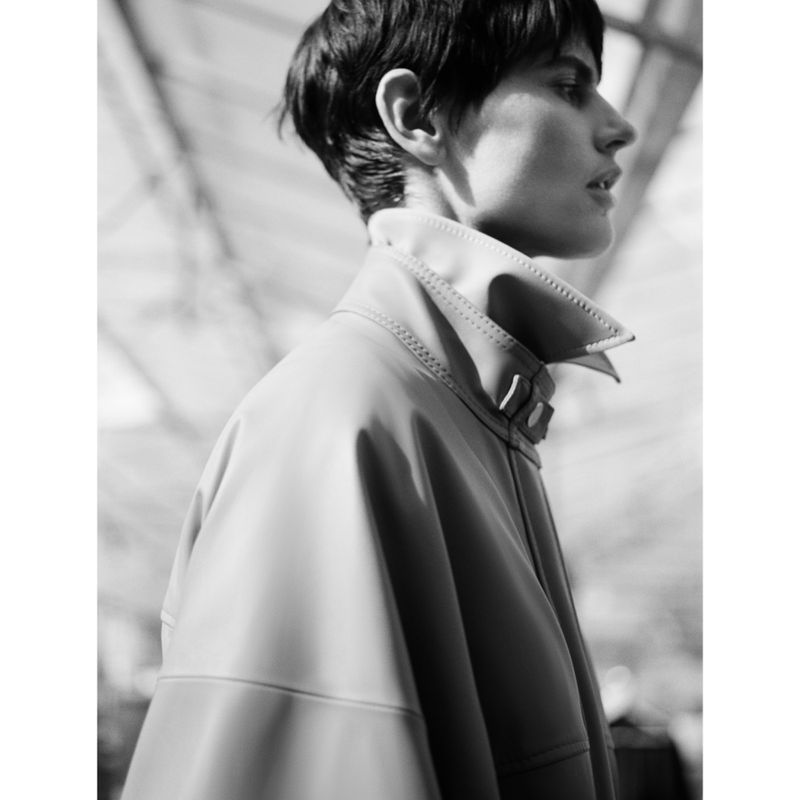 Monochrome portrait of model Saskia de Brauw wearing a high-collared jacket for Gabriele Colangelo S/S 25
