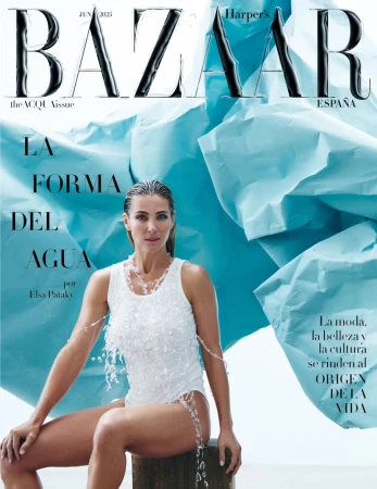 Magazine cover featuring a woman in a white bathing suit against a light blue background with the magazine title BAZAAR prominently displayed.