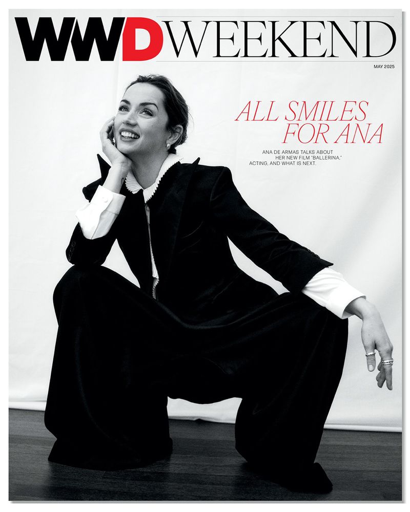 Magazine cover featuring Ana de Armas wearing black jacket and pants, sitting on floor with white background and WWD Weekend logo.