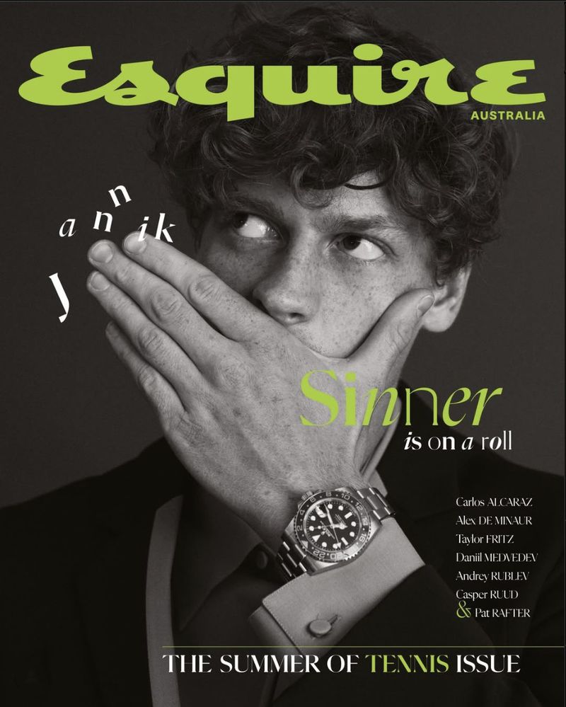 Esquire Australia magazine cover featuring a young adult covering his mouth with his hand and wearing a suit and a watch.