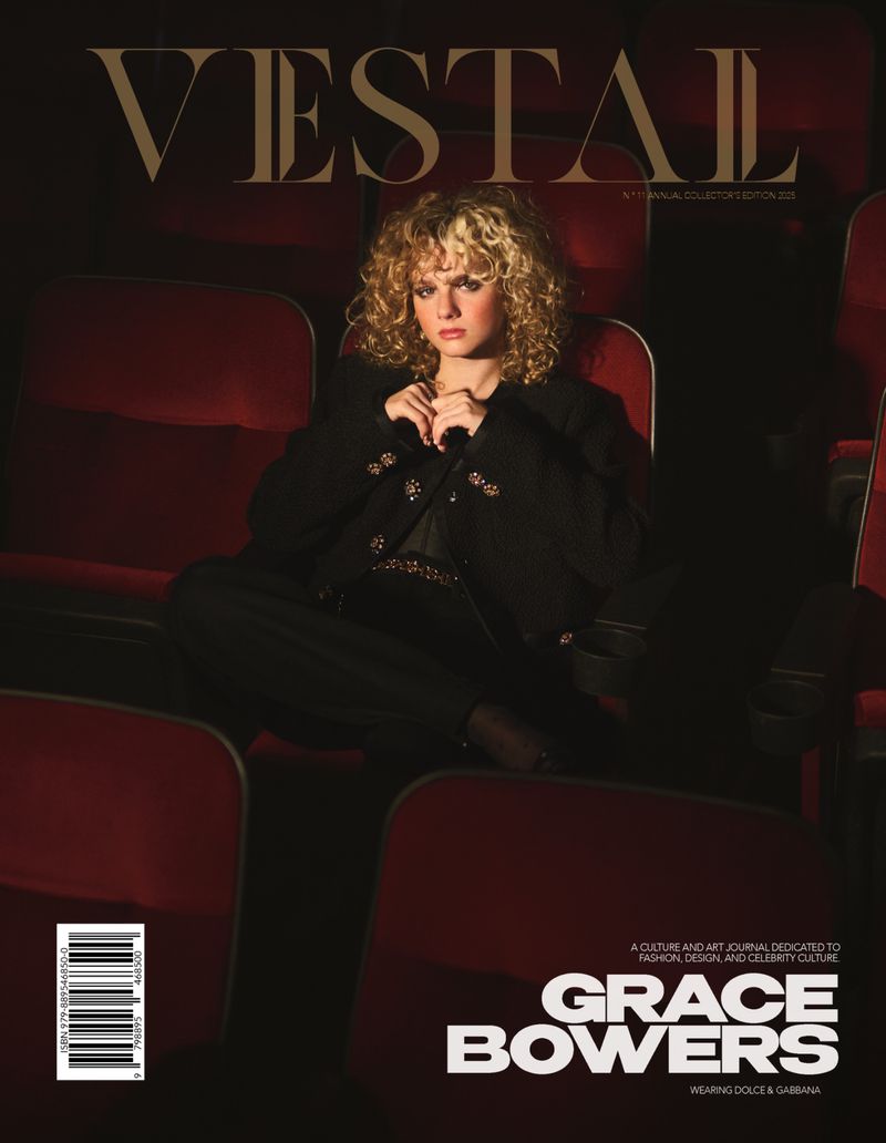 Magazine cover featuring Grace Bowers, an adult female with blonde curly hair wearing black suit, sitting in a red theater seat.