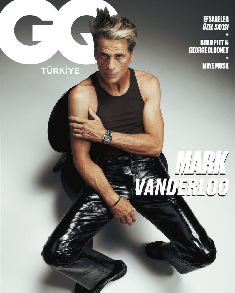 Magazine cover featuring Mark Vanderloo in tank top and shiny black pants sitting in a chair, with 'GQ Türkiye' logo.