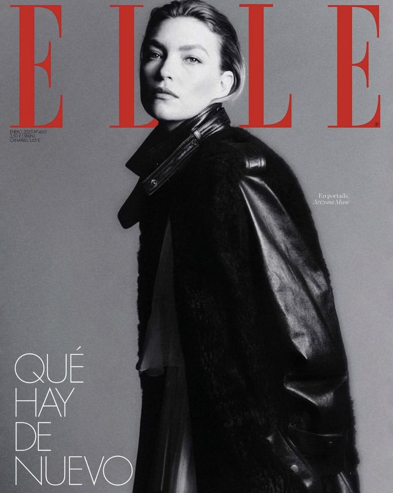Fashion magazine cover featuring an adult female model in a black coat, with the ELLE logo in red and black and white title text.