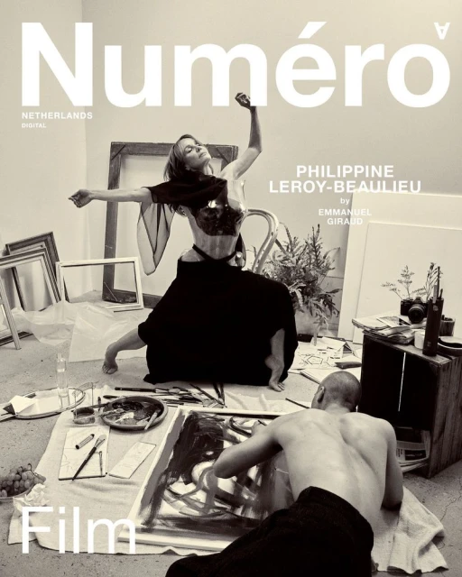 Magazine cover featuring a woman dancing and a man painting, in black and white, with the title 'Numero' visible at the top.