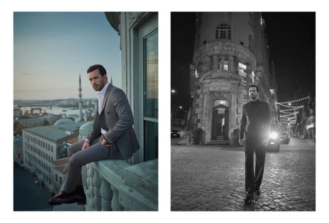Man in a suit poses on a balcony overlooking Istanbul's skyline; grayscale shot of a man in a suit on a city street at night.