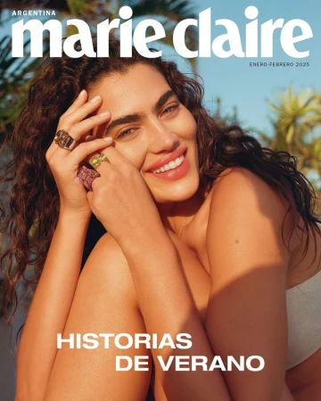 Marie Claire Argentina magazine cover featuring a brunette woman with curly hair and several rings on a blue-sky, palm-tree background.