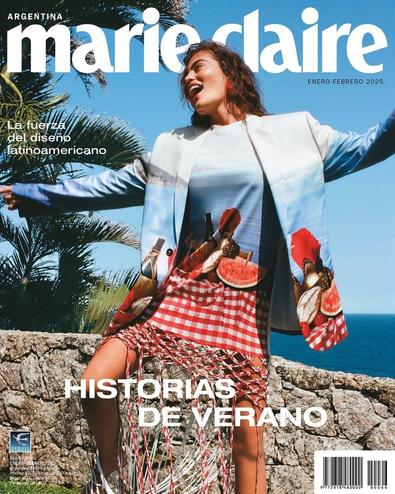 Marie Claire magazine cover featuring a model in a patterned blazer, dress, and sneakers outdoors with ocean and palm trees.