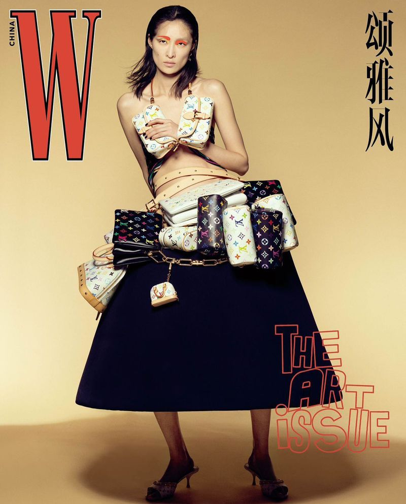 Editorial fashion image featuring a woman wearing a skirt and top made of purses, set against a neutral backdrop with visible magazine text.