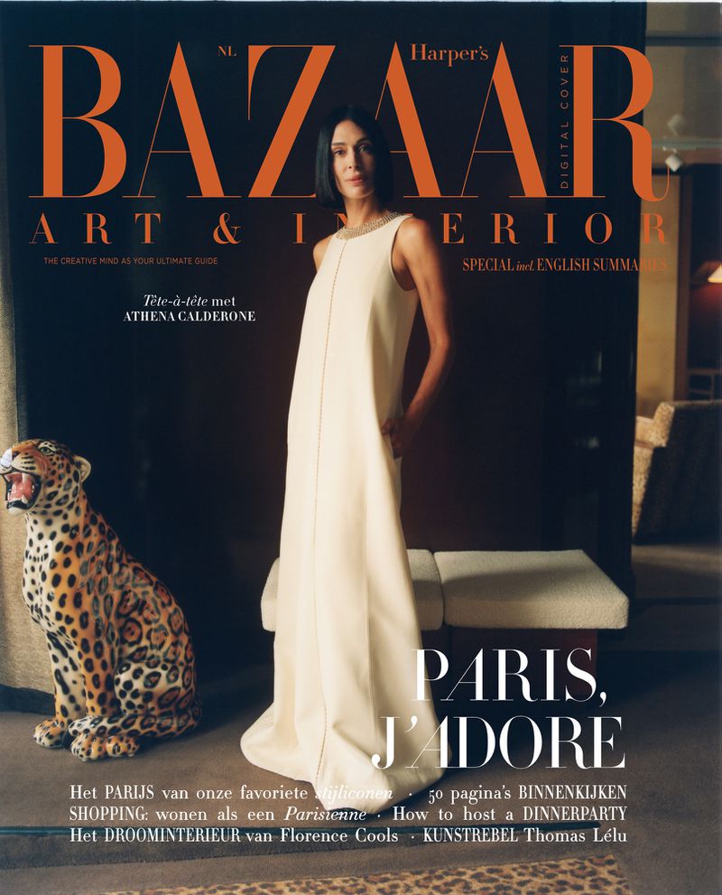 Harper's Bazaar cover featuring Athena Calderone in a cream dress, with a leopard statue and 'Paris, J'adore' text.