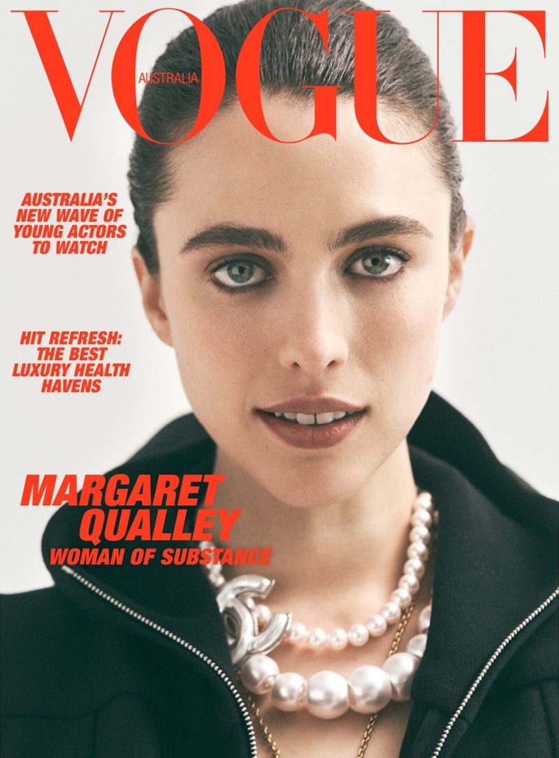 Close-up Vogue Australia cover featuring Margaret Qualley wearing a black jacket and layered pearl necklaces on a white backdrop.