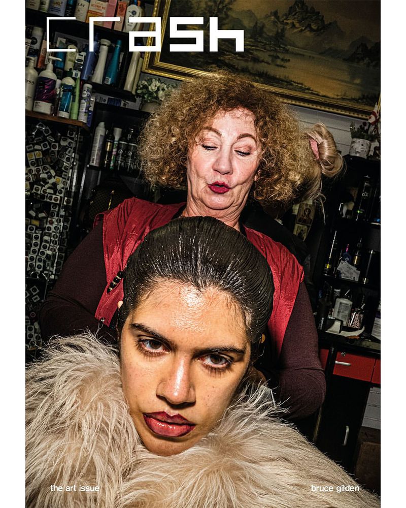 Magazine cover features two women in a beauty salon setting with beauty products displayed in the background; the magazine is titled 'CRASH'.