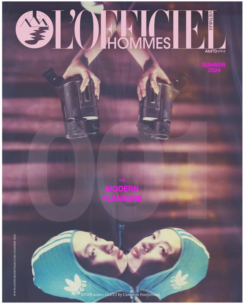 Magazine cover features mirrored faces in turquoise caps, holding vintage cameras, with L'Officiel Hommes logo and summer 2024 text.