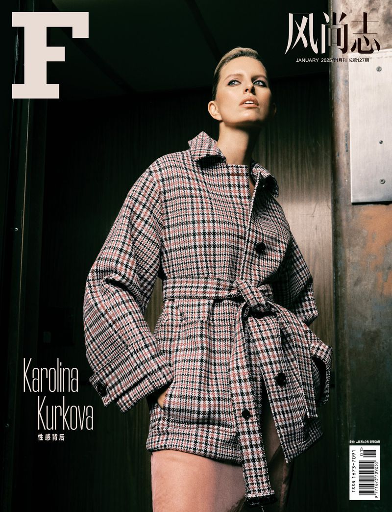 Magazine cover featuring a blonde woman in a plaid coat. The cover includes the magazine's logo, text in both English and Chinese.