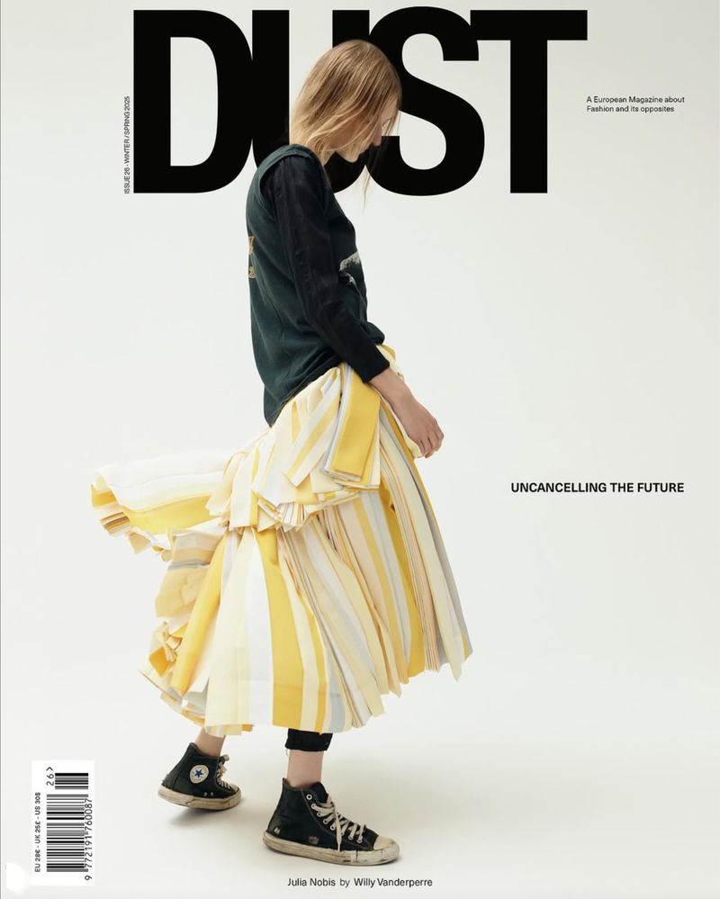 Magazine cover featuring woman in tiered yellow-striped skirt, black top and high-top sneakers, set against a plain white backdrop.