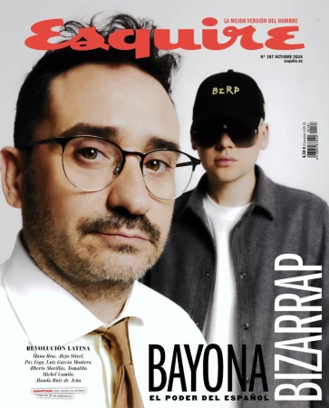 Magazine cover featuring two men: one in glasses and a tie, the other in a baseball cap and sunglasses, with 'Esquire' logo.