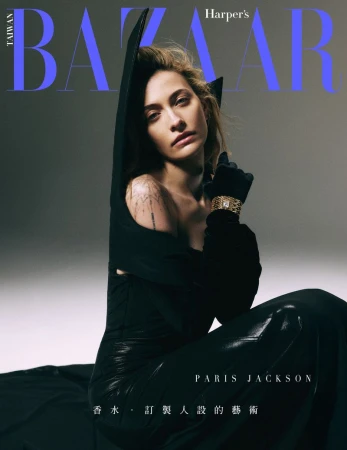 Paris Jackson poses in a black hooded dress and black gloves, accessorized with a gold bracelet, for a Harper's Bazaar Taiwan cover.