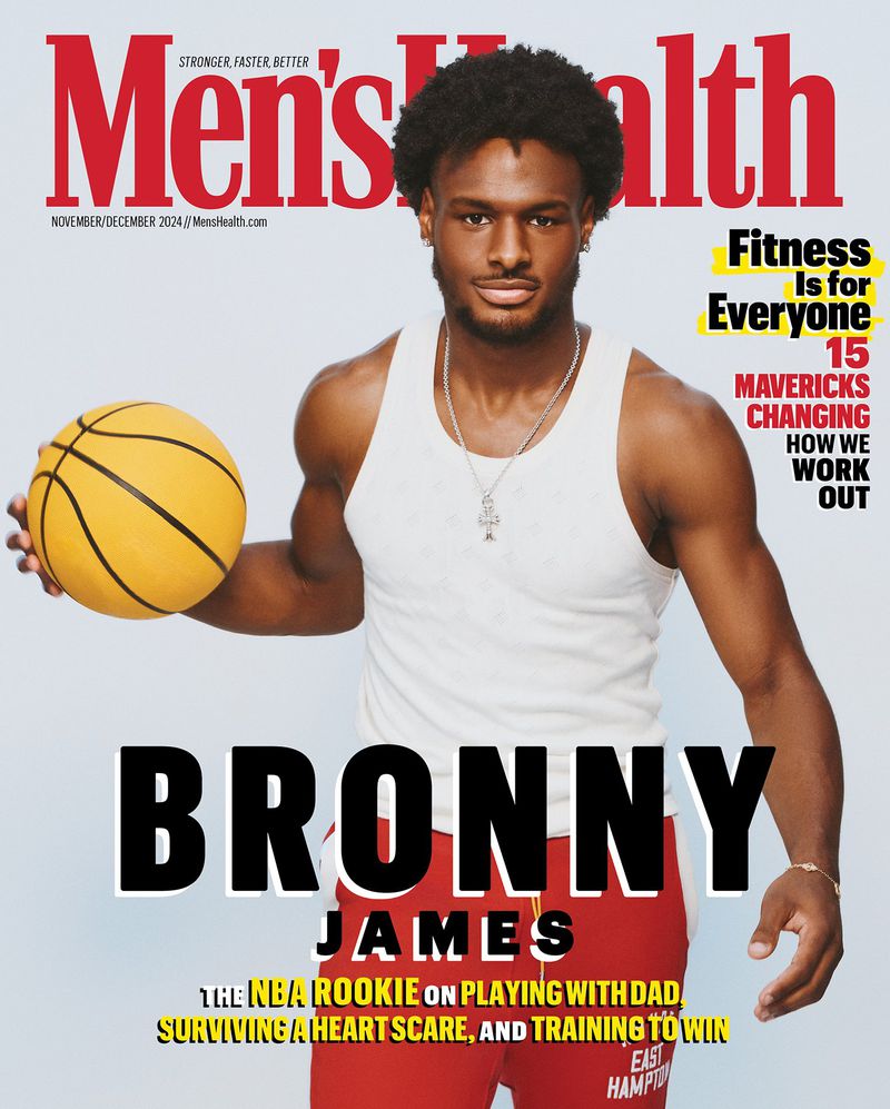 Men's Health magazine cover featuring Bronny James holding a basketball, wearing a tank top and sweatpants against a light grey background.
