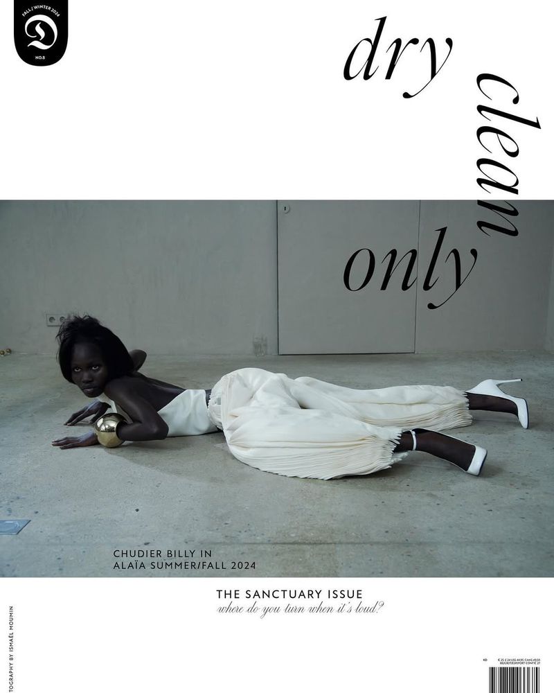 Magazine cover featuring a woman in white lying on the floor with 'dry clean only' text overlay and brand logo in top left.