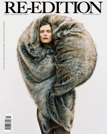 Model Malgosia Bela wearing voluminous faux fur in a portrait for Re Edition Magazine #23 S/S 2025 covers by Davit Giorgadze