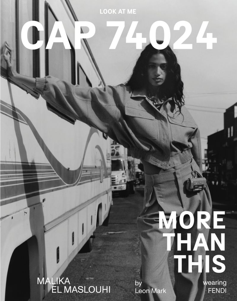 Model Malika El Maslouhi poses next to a large RV in a fashion editorial image, wearing Fendi, with text overlay 'Look At Me' and 'More Than This'.