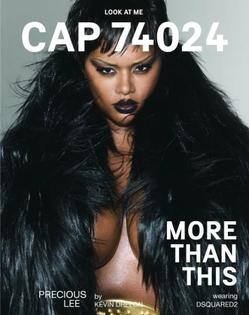 Magazine cover featuring Precious Lee with dark eye makeup and lipstick wearing a black fur coat against a neutral grey background.