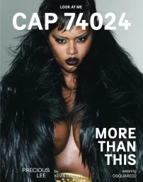 Model Precious Lee wearing a black textured coat against a grey studio backdrop for CAP 74024 winter cover.