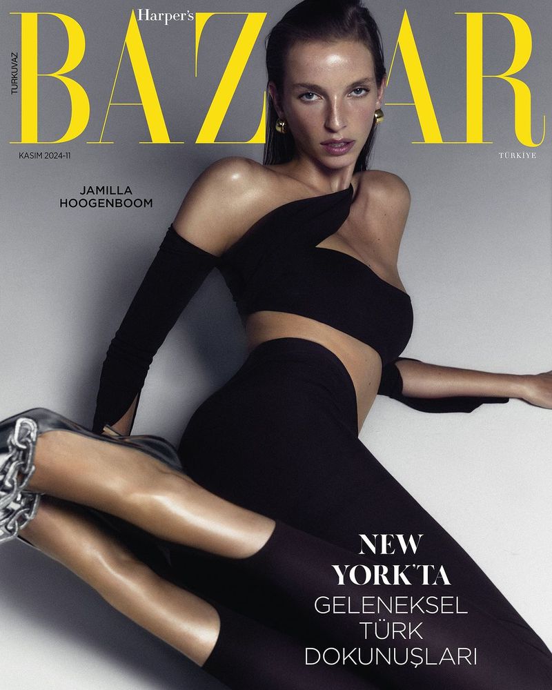 Harper's Bazaar Turkey cover featuring Jamilla Hoogenboom in a black outfit and silver chained heels on a grey background.