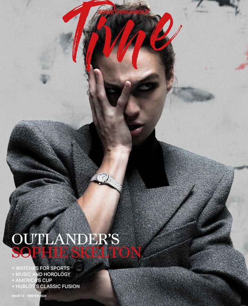 Magazine cover featuring Sophie Skelton in a grey wool blazer and black turtleneck against a grey background with red 'Time' logo.